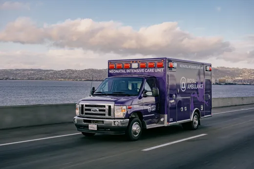 A Royal Ambulance neonatal intensive care unit ambulance on the road.